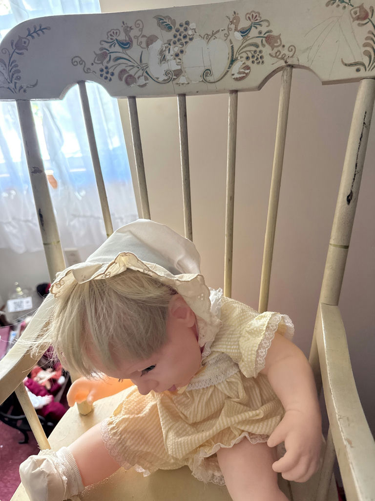 Vintage baby doll on a wooden rocking chair - image 4 of 5