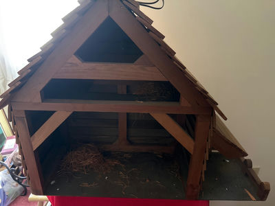Wooden light up creche’ with straw nesting material - Image 1 of 4
