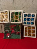 Assorted Christmas glass ornaments and poinsettia arrangement - thumbnail 1 of 4