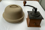 Antique hand-crank coffee grinder and beige ceramic cloche with base - thumbnail 1 of 7