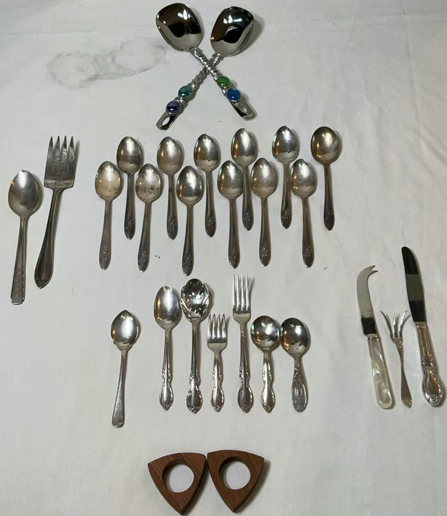 Assorted silverware set with spoons, forks, and knives - image 1 of 7