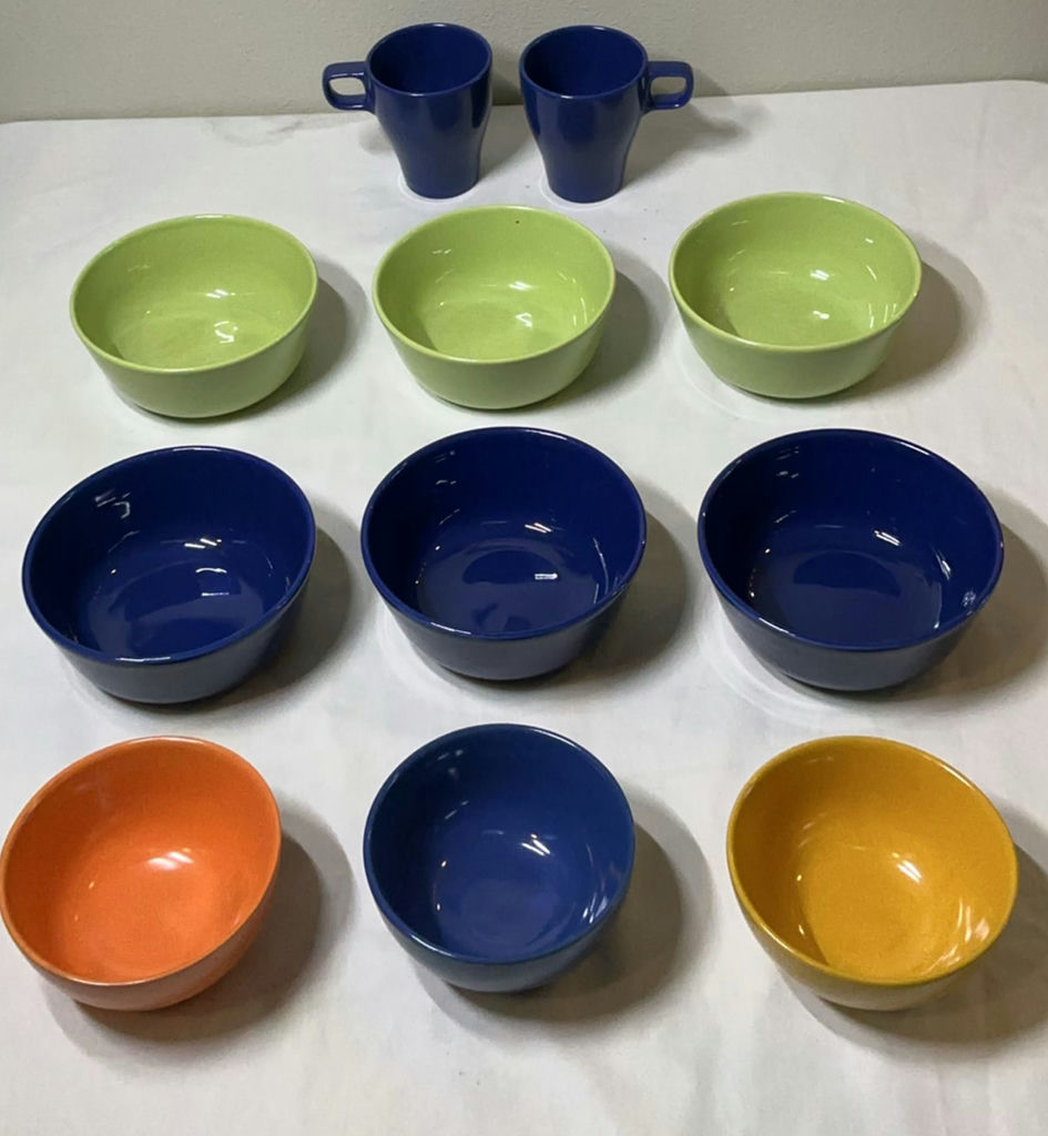 Colorful ceramic bowls with two blue mugs - image 1 of 3
