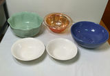 Assorted bowls: green scalloped, amber ribbed glass, blue, and white scalloped-edge - thumbnail 1 of 4