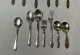 Assorted silverware set with spoons, forks, and knives - thumbnail 5 of 7