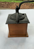 Antique hand-crank coffee grinder and beige ceramic cloche with base - thumbnail 7 of 7
