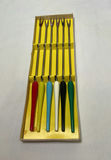 Red fondue pot on stand with burner and colored-handle skewers - thumbnail 3 of 3