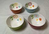 Laurie Gates floral Melamine dinnerware set with bowls, colorful plates, yellow scalloped plates, and red pedestal cups - thumbnail 4 of 6