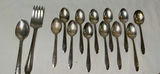 Assorted silverware set with spoons, forks, and knives - thumbnail 3 of 7