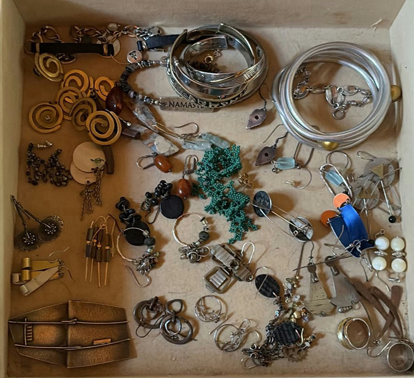 Assorted jewelry collection: bracelets, earrings, beads and trinkets - image 1 of 17