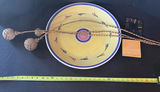 Yellow ceramic bowl with stand, striped tile, and decorative rope tassels - thumbnail 1 of 5