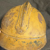 Two vintage helmets: Brodie-style steel helmet with insignia and a pith helmet - thumbnail 5 of 10