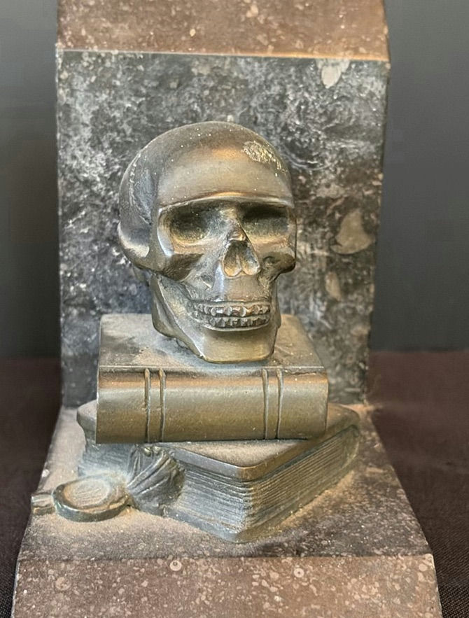 Stone bust bookend pair with skull and serpent motif - image 3 of 6