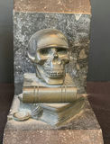 Stone bust bookend pair with skull and serpent motif - thumbnail 3 of 6
