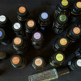 Assorted fragrance bottles, diffuser, and decorative candlesticks - thumbnail 9 of 13