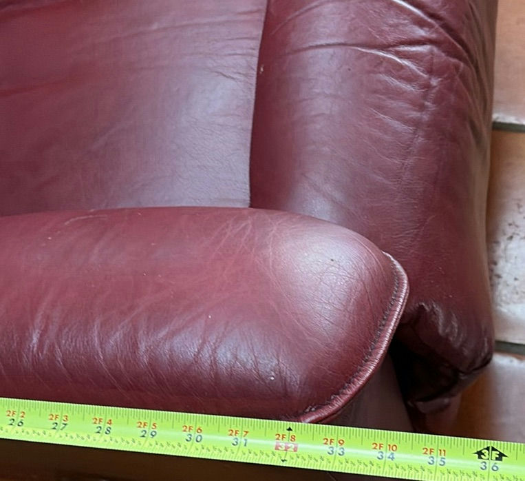 Dark gray fabric recliner and burgundy leather recliner - image 13 of 15