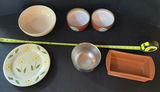 Assorted ceramic bowls, plate, and planters - thumbnail 1 of 6