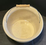 Cream ceramic bowl with blue bands, a black tea kettle, and a cream ceramic tub with wire handle - thumbnail 8 of 9