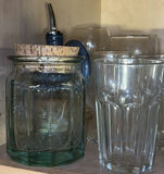 Glassware collection: clear ribbed tumblers, goblets, and a green corked jar - thumbnail 3 of 8