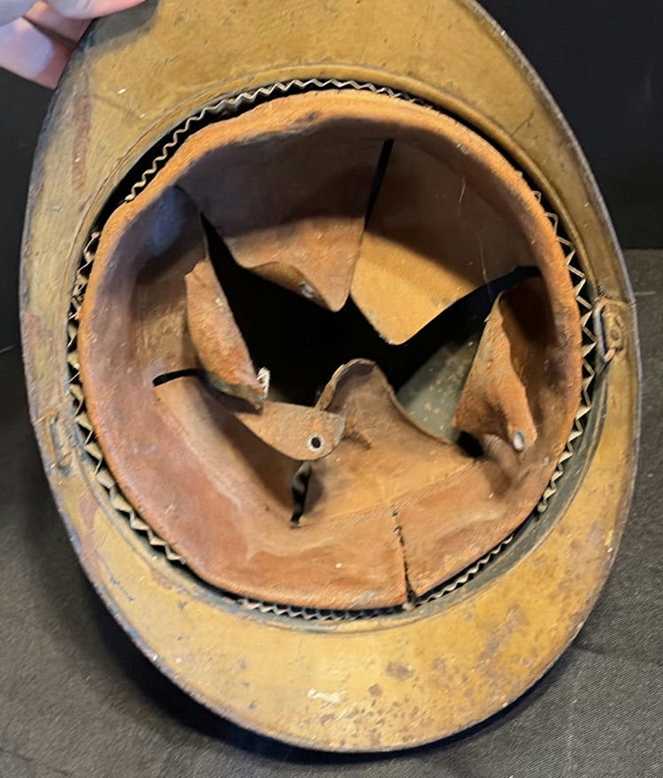 Two vintage helmets: Brodie-style steel helmet with insignia and a pith helmet - image 4 of 10