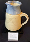 Ceramic teapot, blue-glazed jug, and Kokeshi doll with display plaque - thumbnail 4 of 9