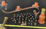 Assorted fragrance bottles, diffuser, and decorative candlesticks - thumbnail 11 of 13