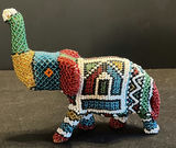 Assorted wooden carvings and beaded figurines - thumbnail 11 of 15