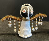 Assorted wooden carvings and beaded figurines - thumbnail 8 of 15