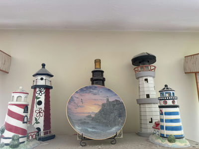 Decorative Lighthouse Figurines and Seascape Plate - Image 1 of 2