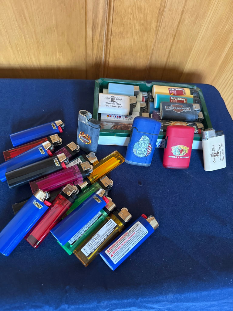 Assorted lighters and cases collection with ashtray - image 1 of 3