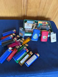 Assorted lighters and cases collection with ashtray  - thumbnail 1 of 3