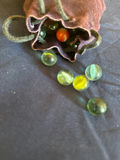 Glass marbles in fabric pouches - thumbnail 4 of 4