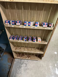 Two-door cabinet with ignition decals, lubricant cans, and spark plug boxes - thumbnail 2 of 2