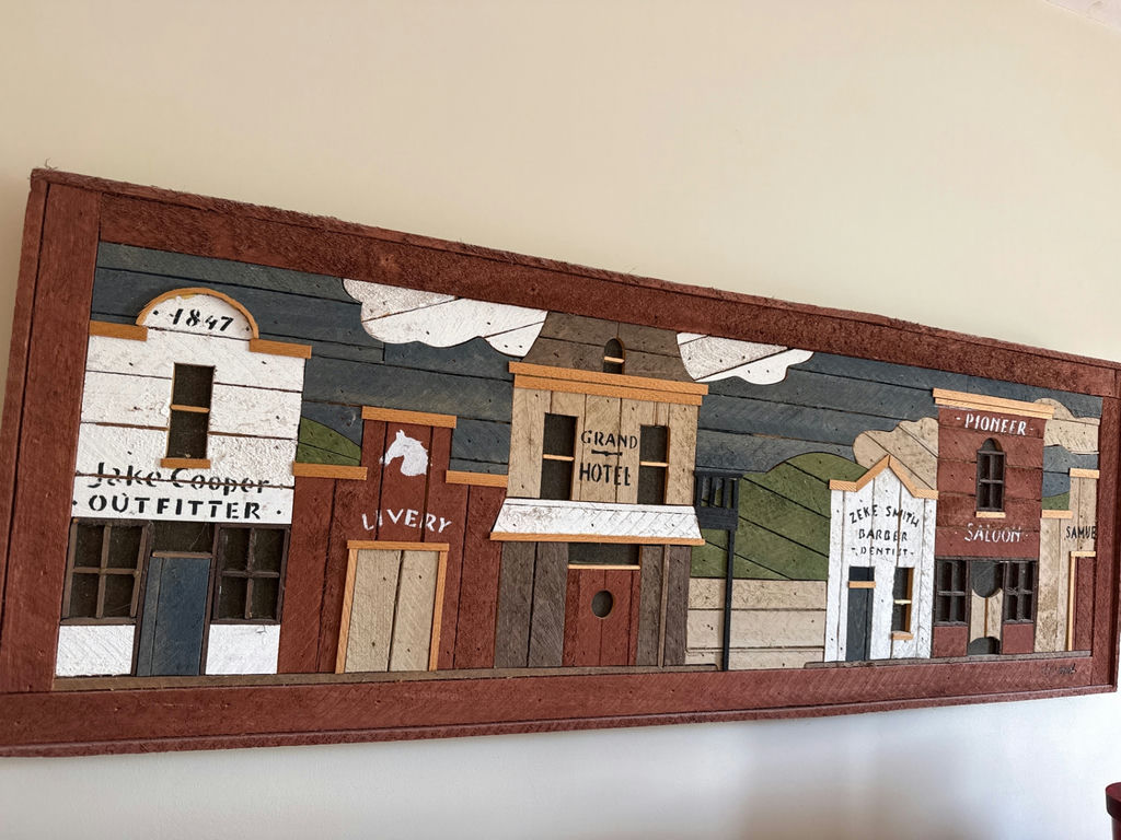 Wooden mosaic wall panel of a Western town storefront row - image 1 of 5