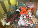 Glass display cabinet with plush stuffed animals - thumbnail 4 of 5