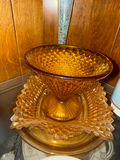 Amber glass compote with crystal dishes and brass candlesticks alongside mugs - thumbnail 3 of 4
