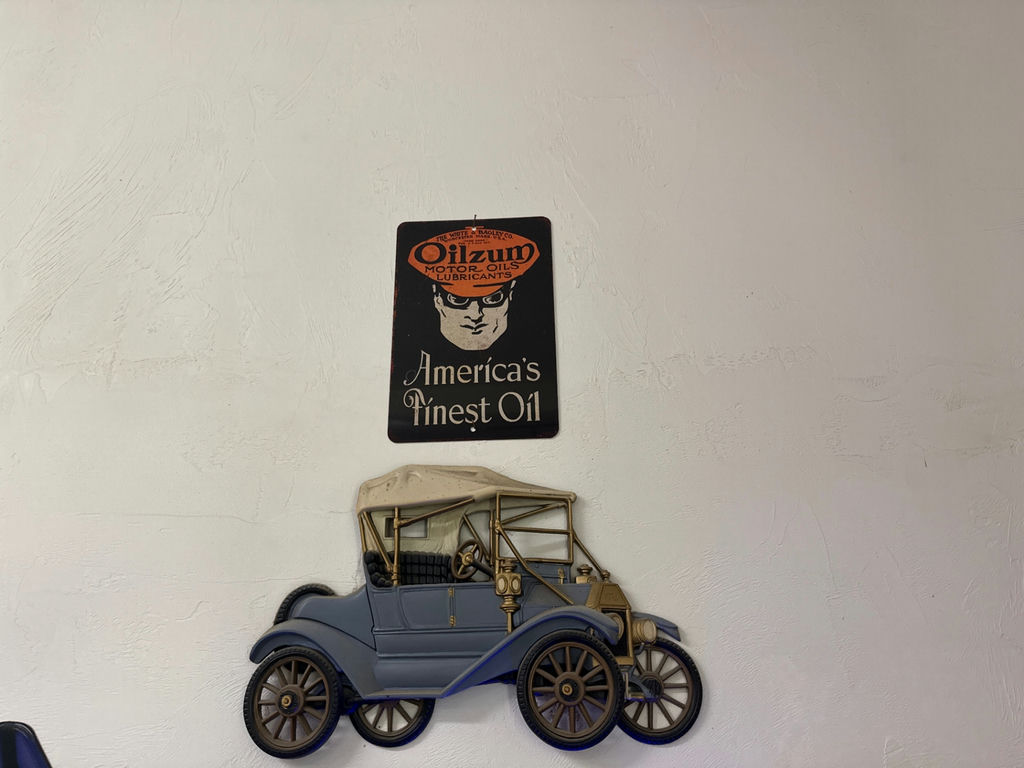 Vintage car wall art and Monroe advertisement sign - image 1 of 2
