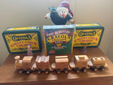 Wooden toy train set with Crayola crayon tins and snowman plush - thumbnail 2 of 2