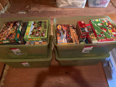 Assorted jigsaw puzzles in storage bins - Image 1 of 4