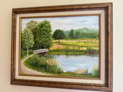 Blackstone Canal Framed landscape painting with pond, dock, and footbridge - Image 1 of 2