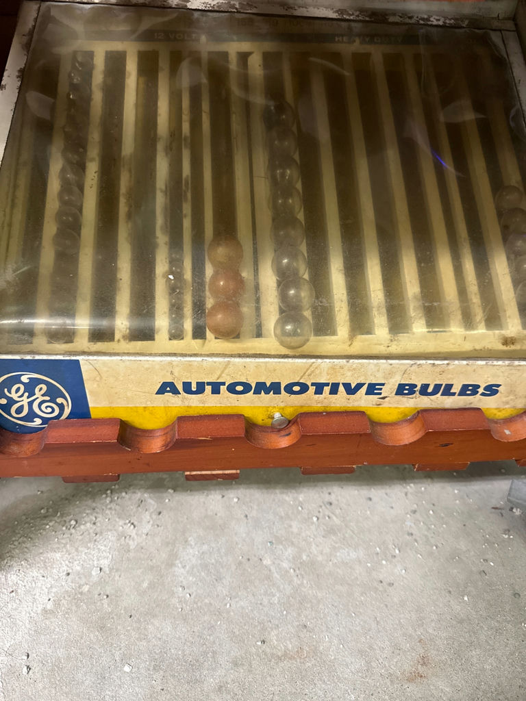 Vintage automotive parts and bulbs display - image 3 of 3