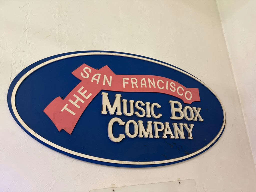Oval San Francisco Music Box Company sign - image 1 of 2