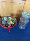 Assorted marbles in a red pedestal dish and glass jar - thumbnail 1 of 2