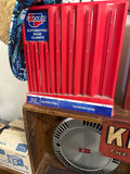 Vintage automotive parts display with Kendall oil sign and hubcaps - thumbnail 4 of 5