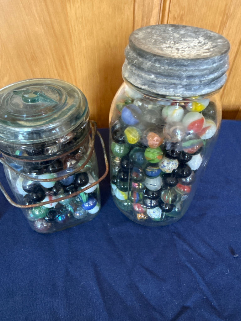 Two glass jars filled with colorful marbles - image 2 of 2
