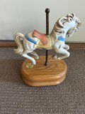 Mini musical carousel horse on wooden base - thumbnail 1 of 3