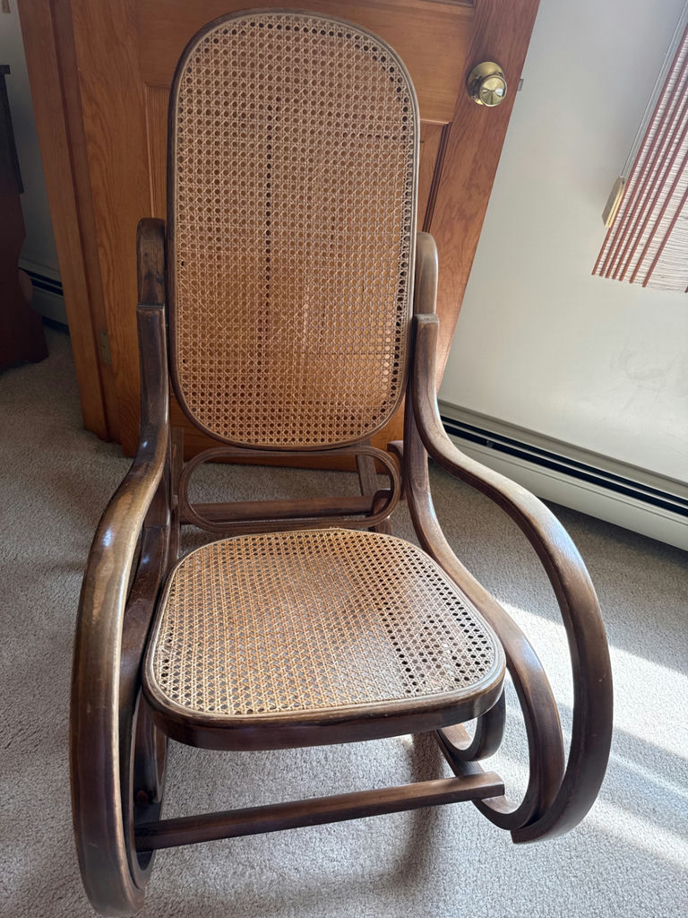 Wooden rocking chair with caned seat and back - image 1 of 3