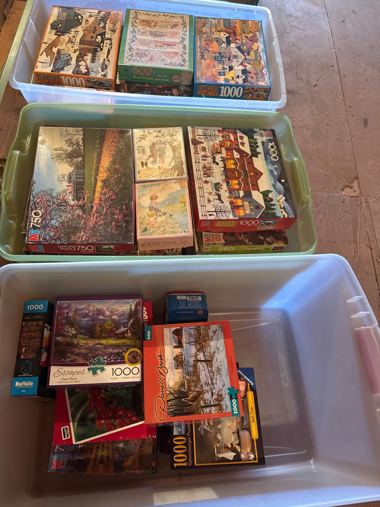 Assorted jigsaw puzzles in plastic bins - image 2 of 3
