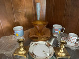 Amber glass compote with crystal dishes and brass candlesticks alongside mugs - thumbnail 2 of 4