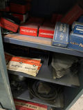 Vintage automotive parts cabinet with ignition and electrical components - thumbnail 4 of 4