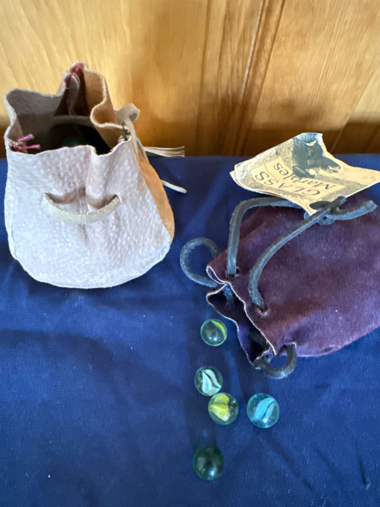 Glass marbles in fabric pouches - image 2 of 4